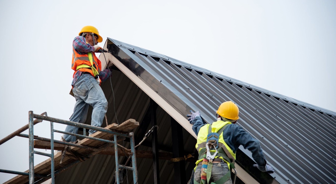 Professional roofing contractors performing roof repair in Florence-Graham, CA